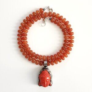 ORANGE COLORED JADE NECKLACE W/ ORANGE BUDDHA PENDANT--20"